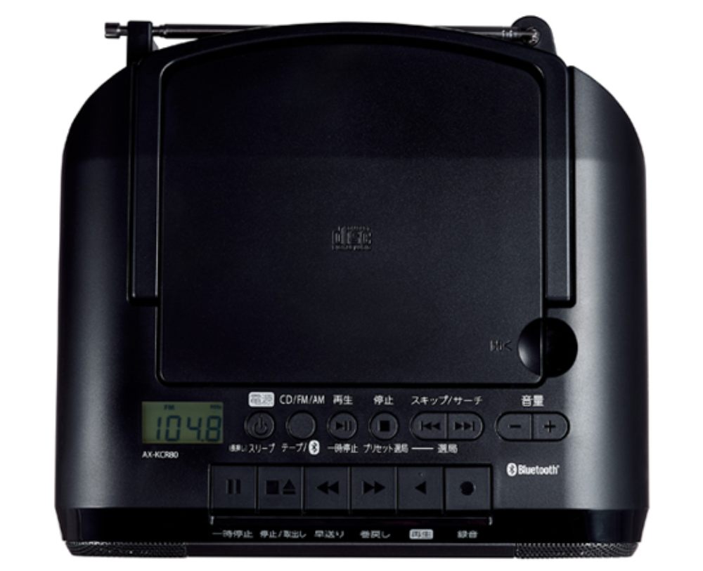 Vue de dessus du Toshiba Aurex AX-KCR80 montrant le lecteur CD, l'écran LCD et le panneau de commandes Bluetooth