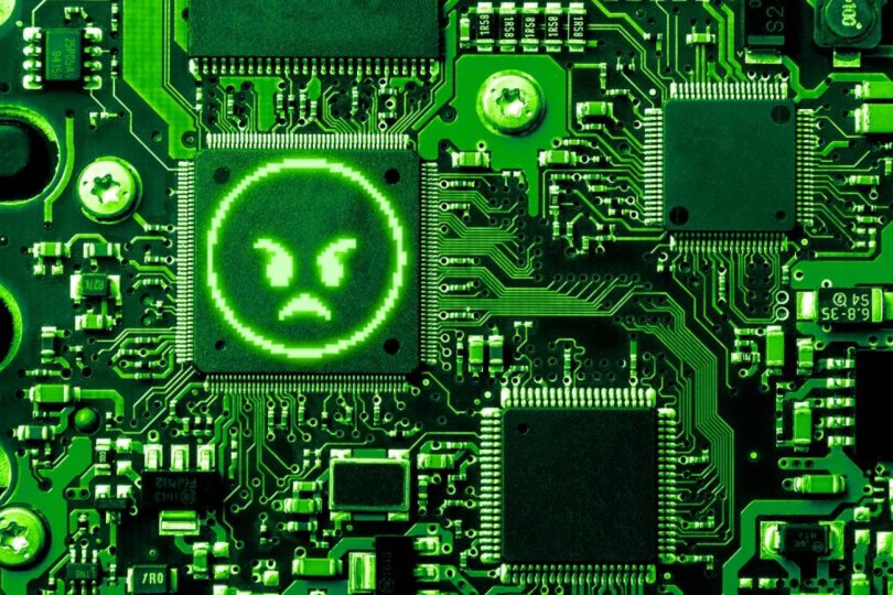 Circuit imprimé vert illuminé par un visage en colère pixelisé, symbolisant l'intelligence artificielle saturant le système de rapports de bugs de sécurité sur Linux.
