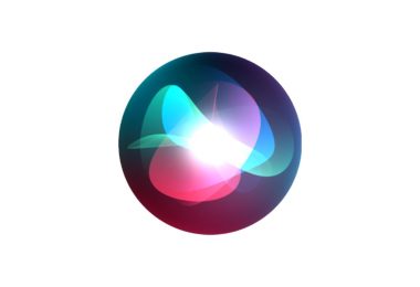 Logo officiel de Siri représenté sous la forme d'une sphère lumineuse et colorée (tons de bleu, rose, violet et turquoise) sur fond blanc, symbolisant l'interface de l'assistant vocal d'Apple en plein traitement d'intelligence artificielle.