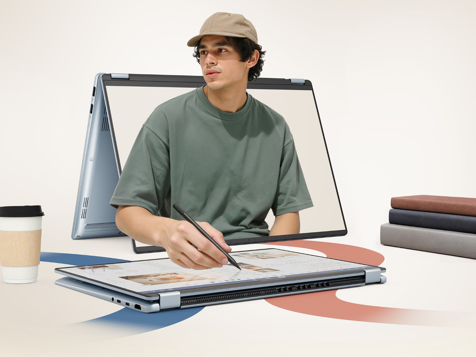 Un jeune homme dessine avec un stylet sur un Asus Vivobook Flip replié à plat en mode tablette sur un bureau, tandis qu'il semble sortir de l'écran d'un second Vivobook placé derrière lui en mode tente. L'image illustre la créativité et la flexibilité de la charnière 360 degrés.