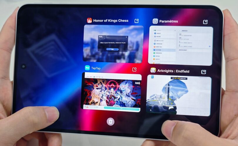 Honor Win Pad, tablette gaming compacte à écran OLED tenue à deux mains en mode paysage, multitâche avec quatre applications de jeu et de réglages ouverts