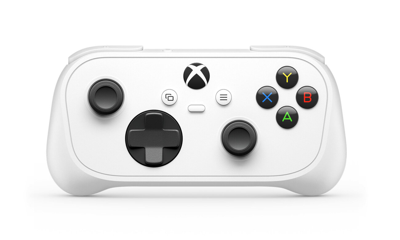 Manette XBOX Nano blanche vue de face sur fond blanc, avec sticks noirs, croix directionnelle noire, boutons A B X Y colorés et bouton Xbox central