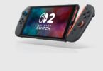 Console Nintendo Switch 2 en mode portable avec ses Joy-Con 2 bleu et rouge, visée par le jailbreak ns2jb qui exploite le logiciel SmileBASIC 4