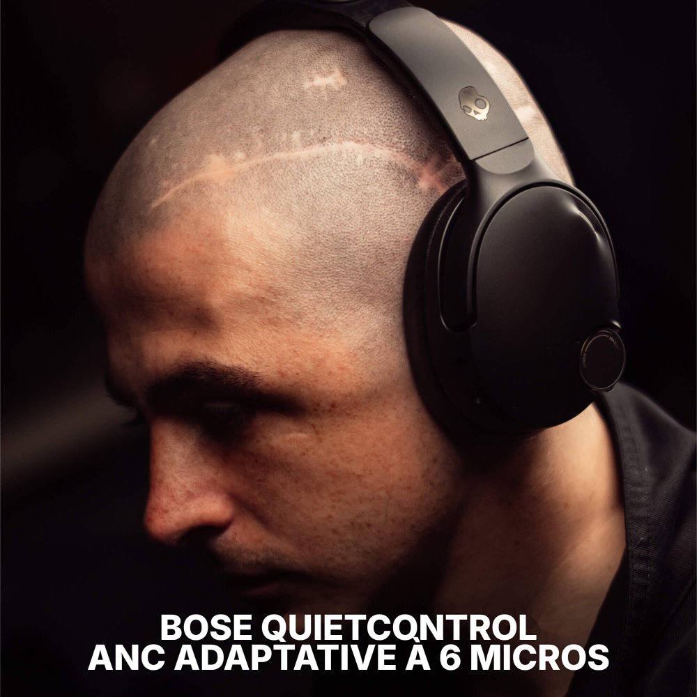 Homme portant le casque Skullcandy Crusher 1080 ANC noir, avec la mention traduite Bose QuietControl, réduction de bruit adaptative à 6 micros